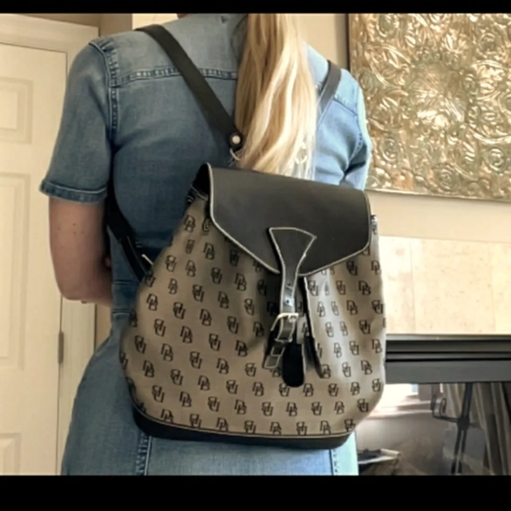 Vtg Dooney & Bourke signature monogram canvas leather backpack